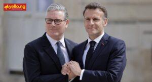 France's President Emmanuel Macron (R) greets Britain's Prime Minister Keir Starmer as he arrives to co-chair a meeting of allies to consider sending a multinational force to ensure security and free-flowing trade in the Strait of Hormuz on April 17, 2026.