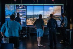 Wildfire monitors at the University of California, San Diego, show a fire in July in Topanga Canyon in Los Angeles, July 26, 2023. Firefighters are training a robot to scan the horizon for fires -- it turns out a lot of things look like smoke. (Ariana Drehsler/The New York Times)