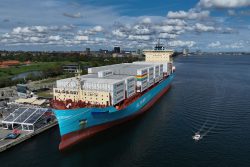 This aerial view taken on September 14, 2023 shows the world's first methanol-enabled container vessel called "Laura Maersk" of A.P. Moller-Maersk after its namegiving ceremony in Copenhagen. Built in South Korea by Hyundai Heavy Industries (HHI) and fitted with a dual-fuel engine, "Laura Maersk" is a relatively small model that will be able to transport 2,136 20-foot (TEU) containers. It will begin operating in the Baltic Sea in October 2023, Maersk said. (Photo by Sergei GAPON / AFP) (Photo by SERGEI GAPON/AFP via Getty Images)